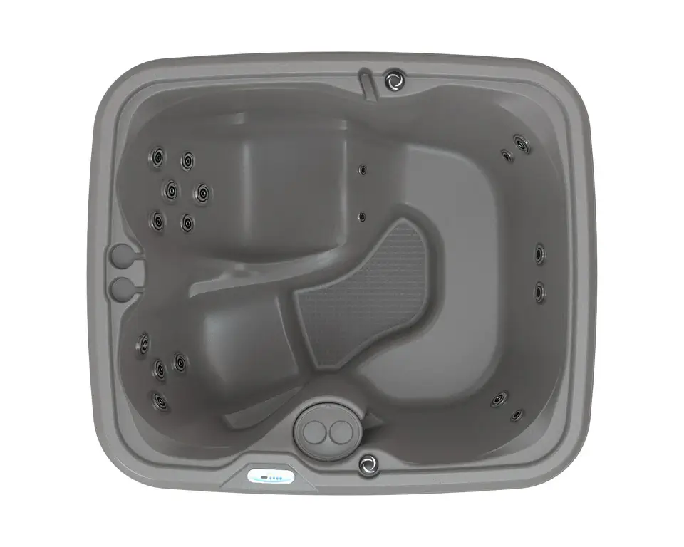 Overhead view of the DreamMaker Core 1800L hot tub showing the full-length lounger and upright seating