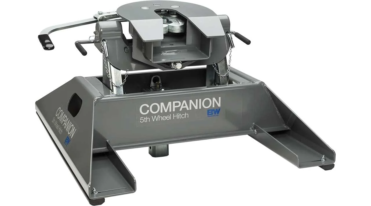 B&W Companion 5th wheel hitch with gray metal base, opening coupler, and safety chains displayed from above view