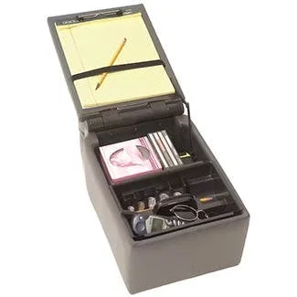 Gray plastic storage box with open lid showing sticky notes on top and compartments filled with various items and cables