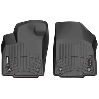 Two black rubber floor mats with ribbed texture and metal grommets, placed side by side on white background