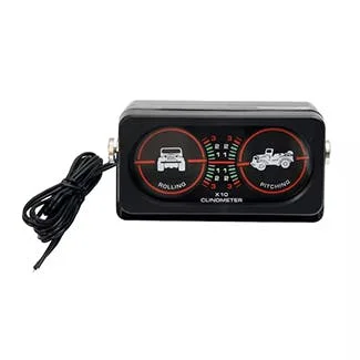 Black dual gauge dashboard display with truck and car icons and red needle indicators, connected cord visible on left side