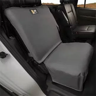 Gray protective seat cover installed on rear bench seat of truck interior