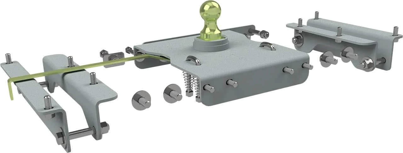 Disassembled gooseneck hitch components including gray metal plates, bolts, yellow ball mount, and adjustment hardware laid