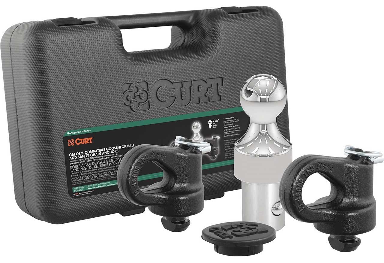 CURT gooseneck hitch kit with chrome ball, black cast iron puck anchors, and accessories displayed with gray carrying case
