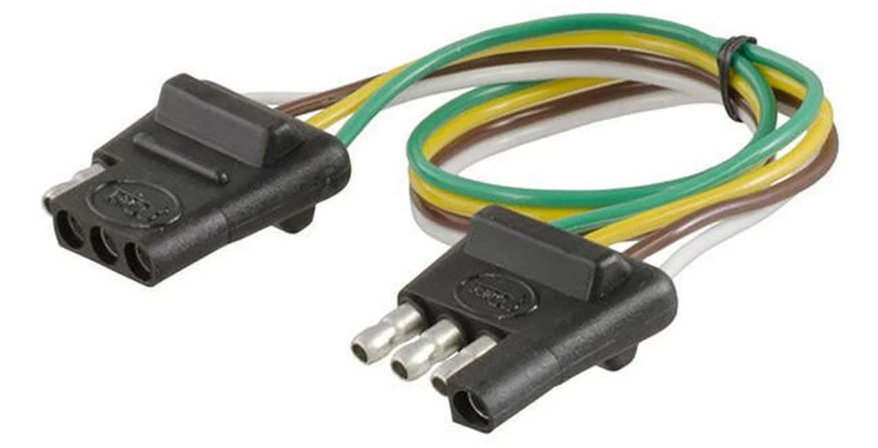 Black trailer wiring connector with four-prong plug and four-wire harness in green, yellow, brown, and white colors.