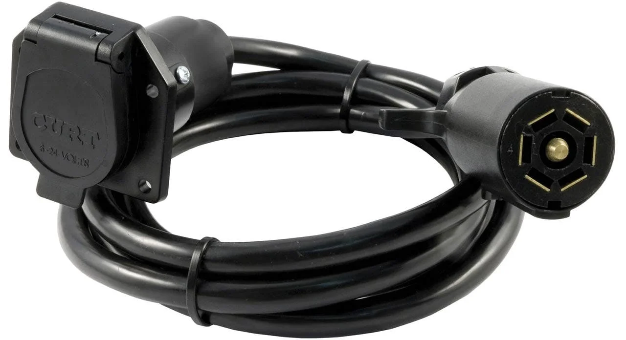 Black plastic trailer wiring connector with 4-way socket and matching plug attached to coiled cable.