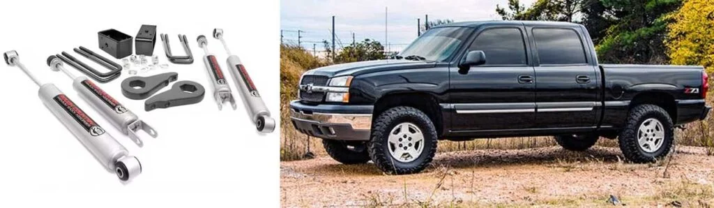 Suspension lift kit components including shock absorbers, brackets, and hardware laid out on white background