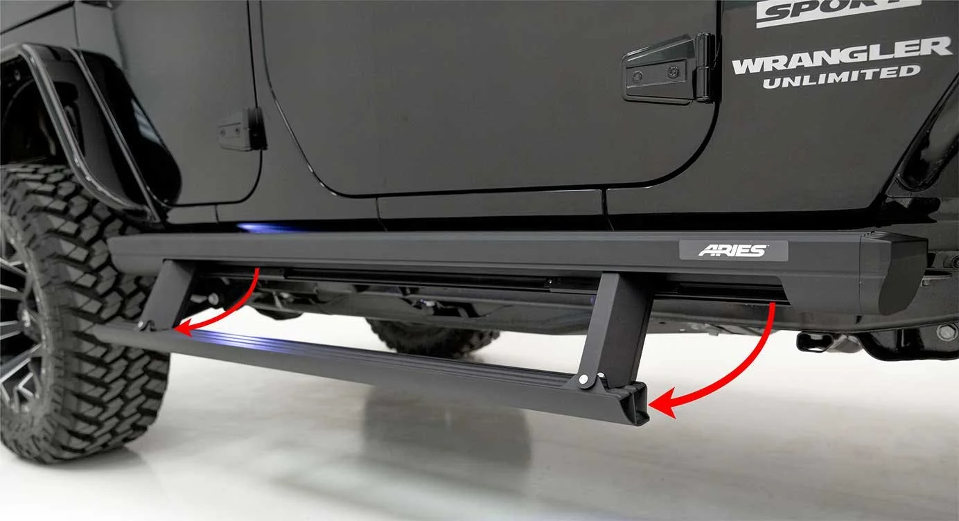 Aries running board with illuminated blue trim mounted beneath Jeep Wrangler Unlimited door, shown with red arrows