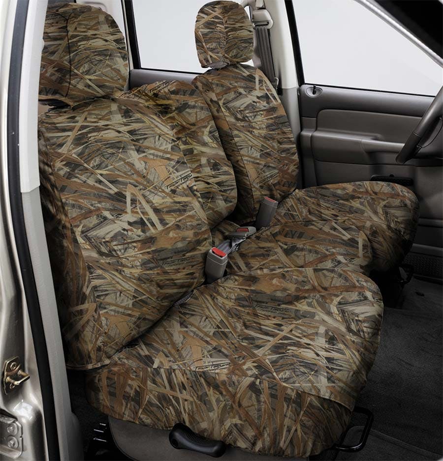 Camouflage seat covers with marsh grass pattern installed on truck cab front seats