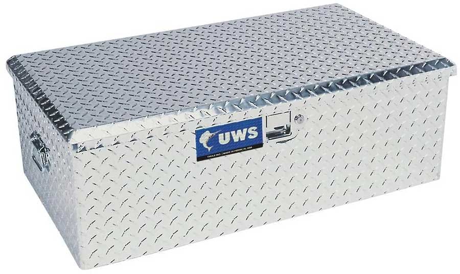 Silver aluminum foot locker tool box with diamond plate top and UWS logo on front, displaying carry handles on sides
