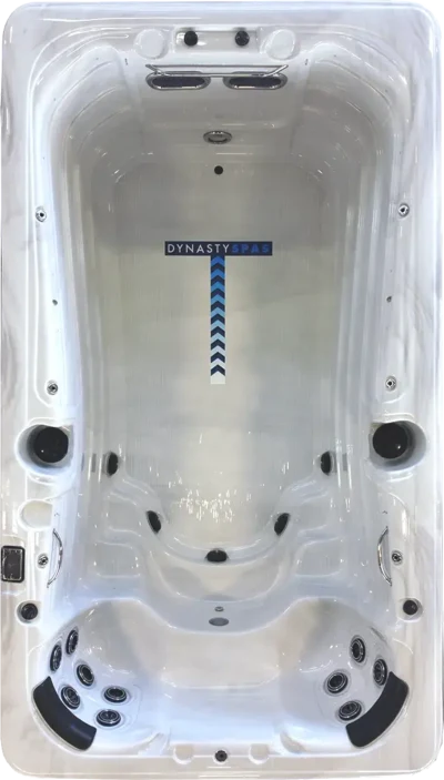 Overhead view of the 13 foot Aquex Pro swim spa showing the swim lane, the current arrow and the therapy seating at the far end